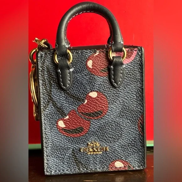 Coach Navy and Burgundy Cherry Print Key Holder - Picture 9 of 15